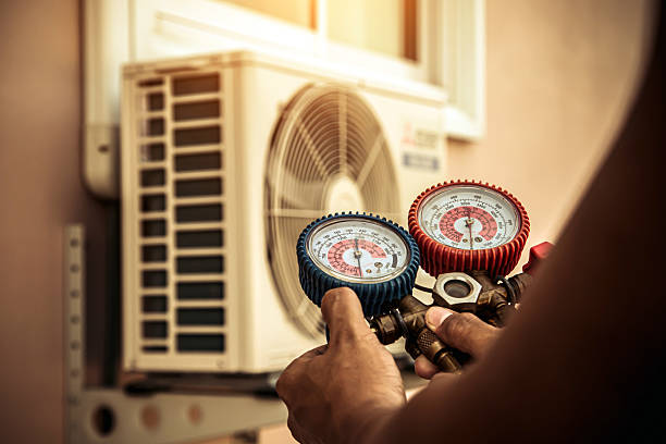 Professional Air Conditioning Service technician working in Hamilton, AL